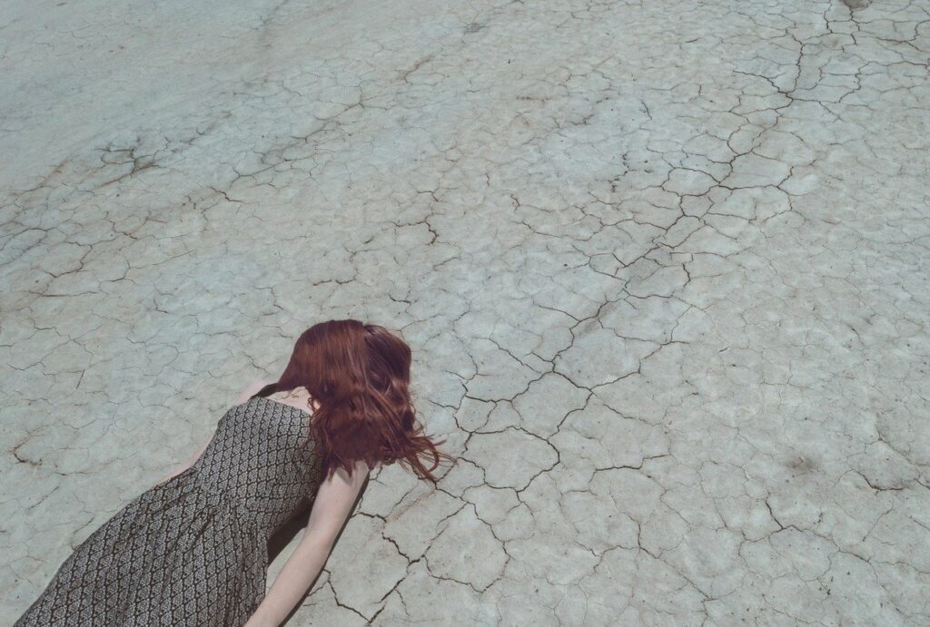 girl sleeping on floor