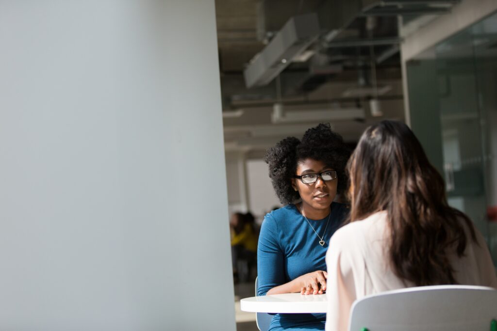 two woman talking